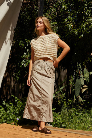 model wearing a pull on maxi skirt with knit top