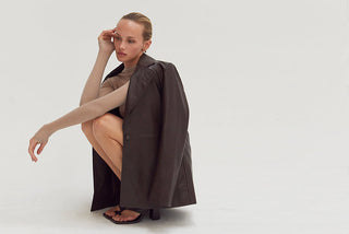 woman wearing a white mini dress by following the 333 method