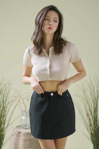 mixed pattern outfit with denim and knit
