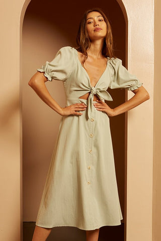 model wearing a sage front-tie dress