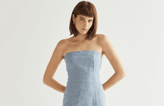 Woman wearing a red dress as her spring date night outfit