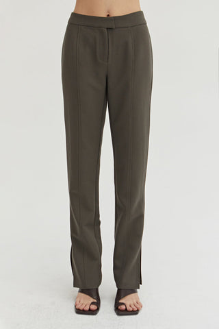 A  dark olive straight leg trousers.