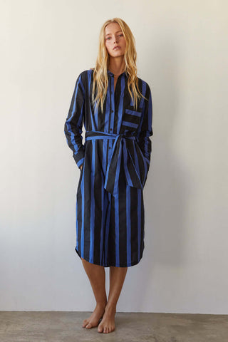 model wearing a blue and black button-up shirt dress