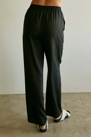 model wearing eco-conscious women’s pants