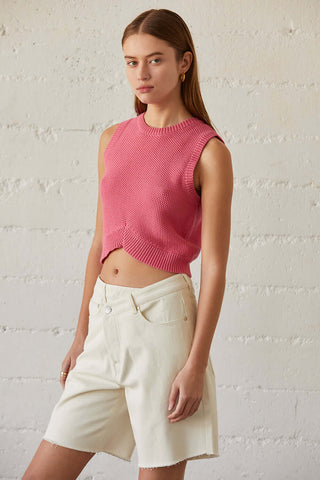 model wearing a pink sleeveless crop top