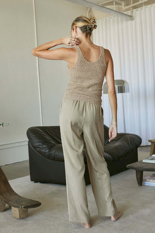 model wearing a tan elastic tencel pants for women