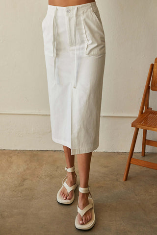 model wearing a white elastic pencil skirt