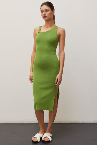 A woman wearing a fern asymmetric shoulder with back cut out midi knit dress.