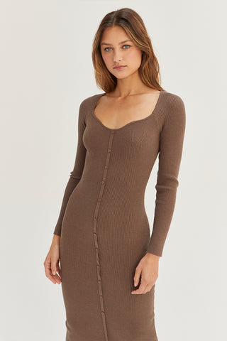 A model wearing an espresso sweater dress.