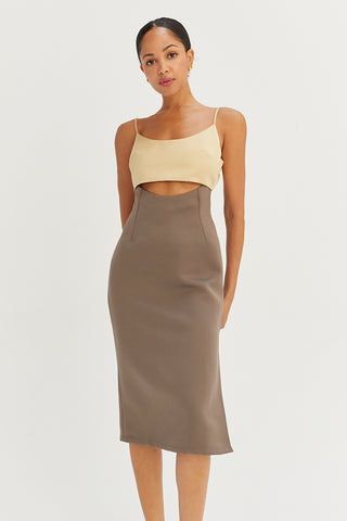 A model wearing a yellow/grey color-block satin midi dress.