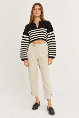 model wearing beige cargo pants with cropped sweater