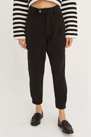 model wearing black high-waist cargo pants