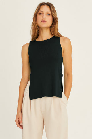 model wearing a black sweater top