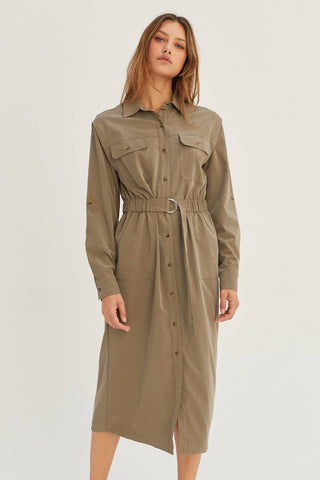 model wearing belted midi dress with pockets