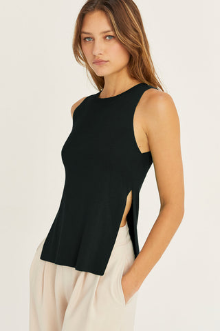 model in black knit sweater tank