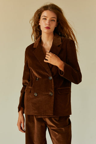 model wearing brown corduroy blazer