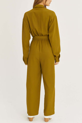 model wearing an olive elastic waist jumpsuit